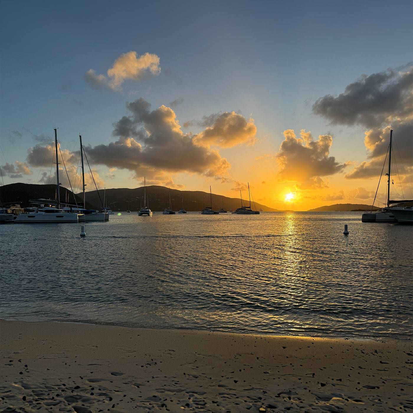 owners-rendez-vous-british-virgin-islands-fountaine-pajot-sailing-catamaran-sunset-2024
