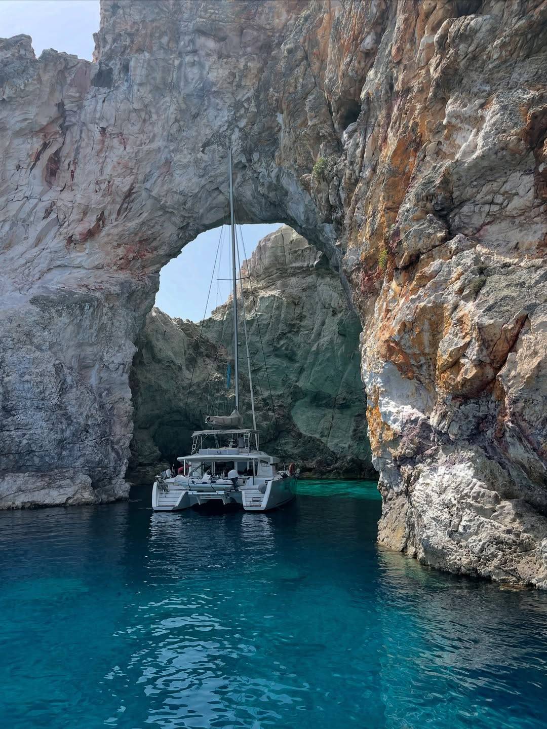Anchored in the surreal beauty of Sarakiniko, Milos — where white volcanic rocks meet the endles (4)