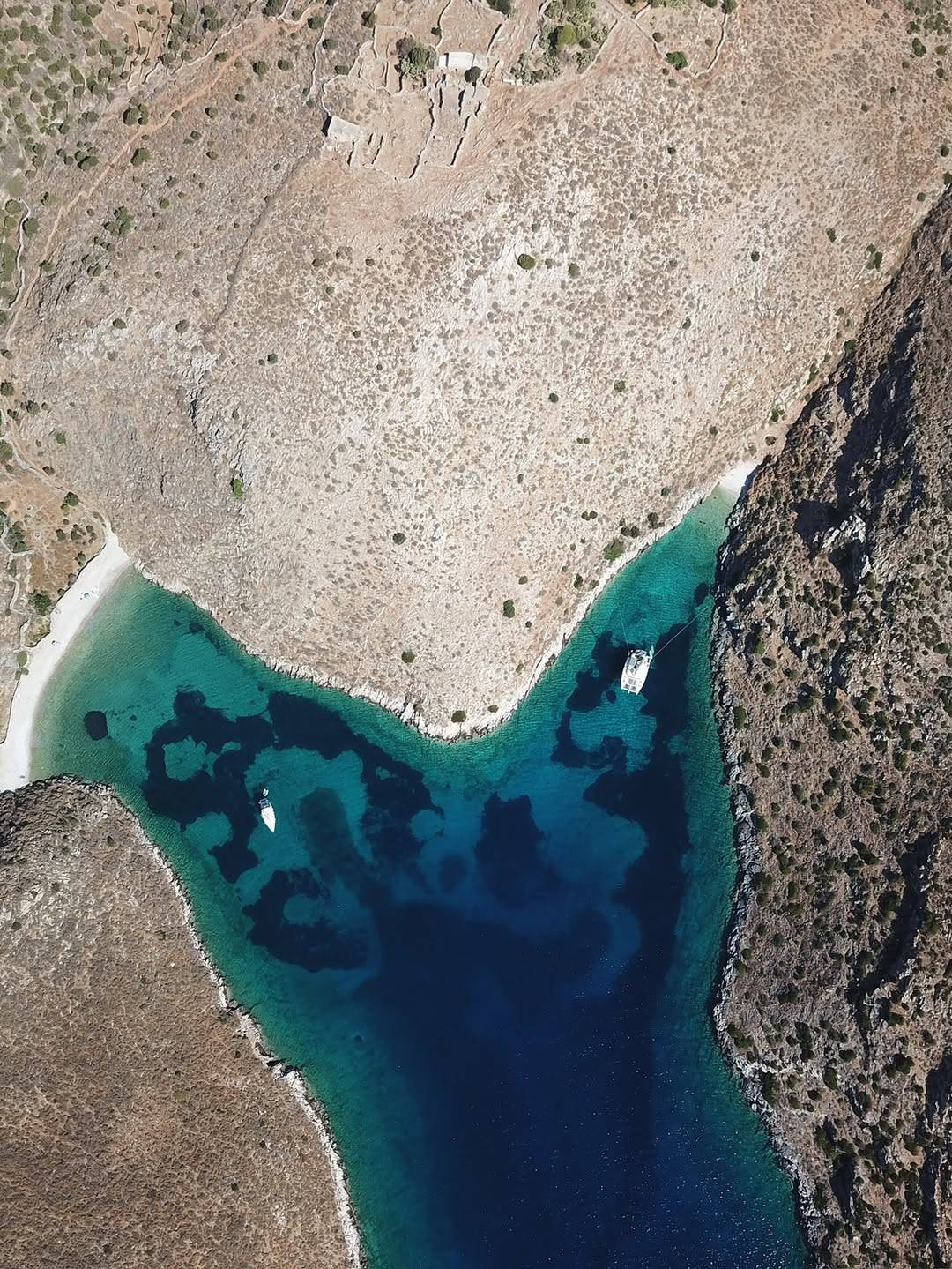 In the peaceful setting of a quiet location in Mani, where gentle waves rock the Catamaran, we f (2)